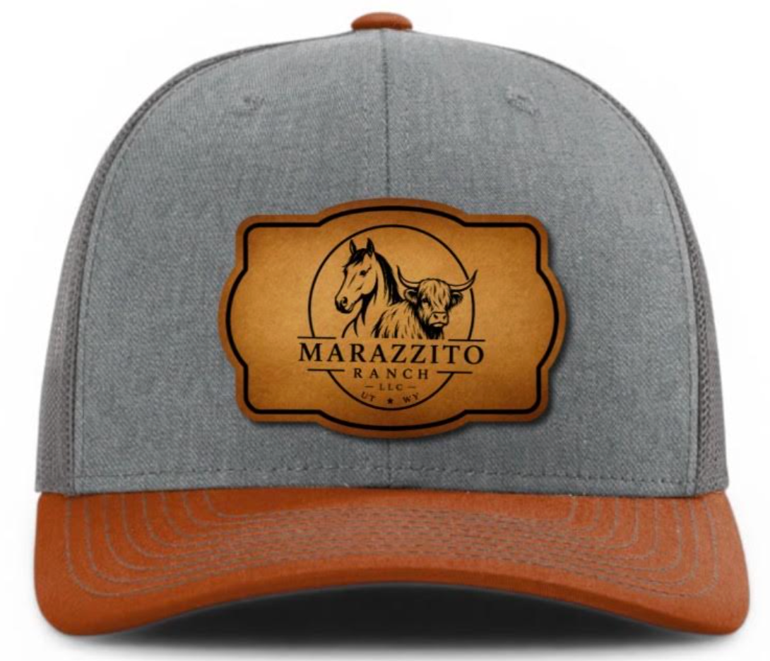 Heather grey, charcoal, and dark orange Marazzito Ranch trucker hat with leather logo patch
